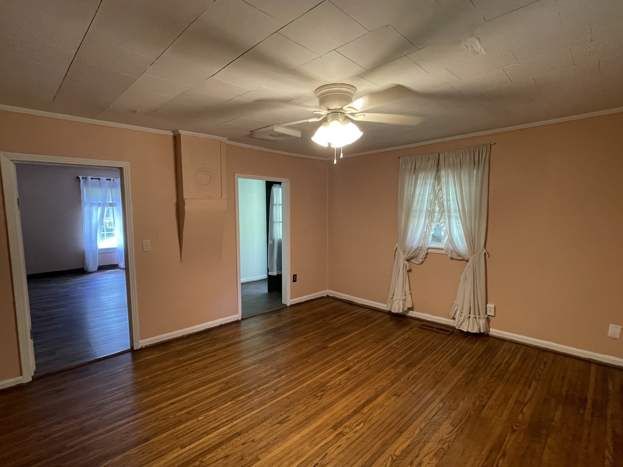 630 Pruett Road Dickson, TN 37055 - Photo 9 of 24 wooden floor in an empty room with a window