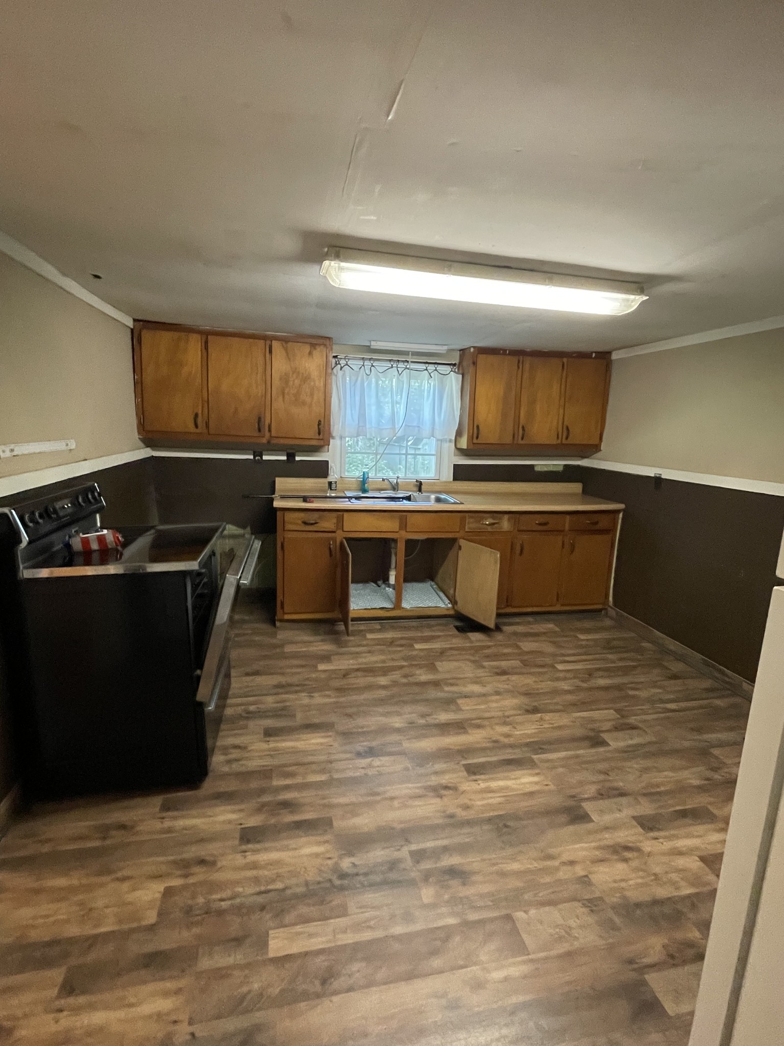 630 Pruett Road Dickson, TN 37055 - Photo 10 of 24 a room with wooden cabinets