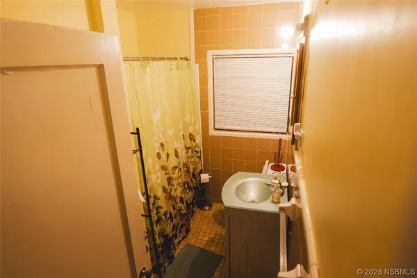 a bathroom with a sink and a toilet