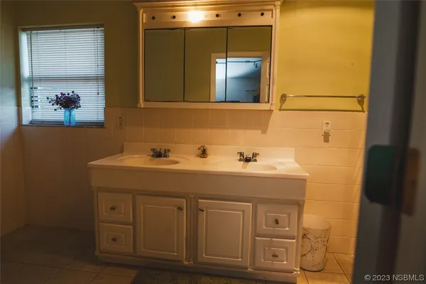 a bathroom with a toilet and a sink