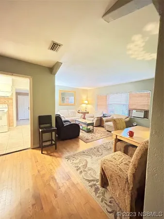a view of workspace with wooden floor