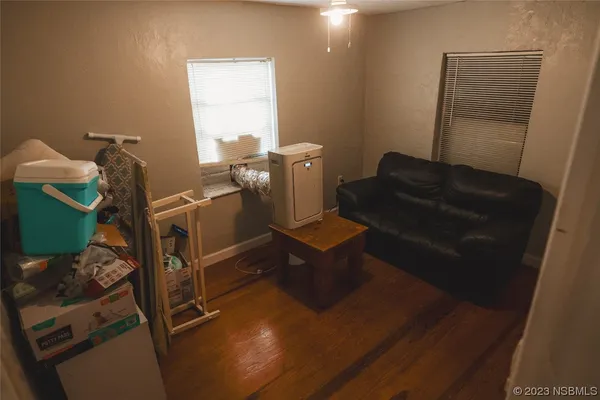a view of a livingroom with furniture