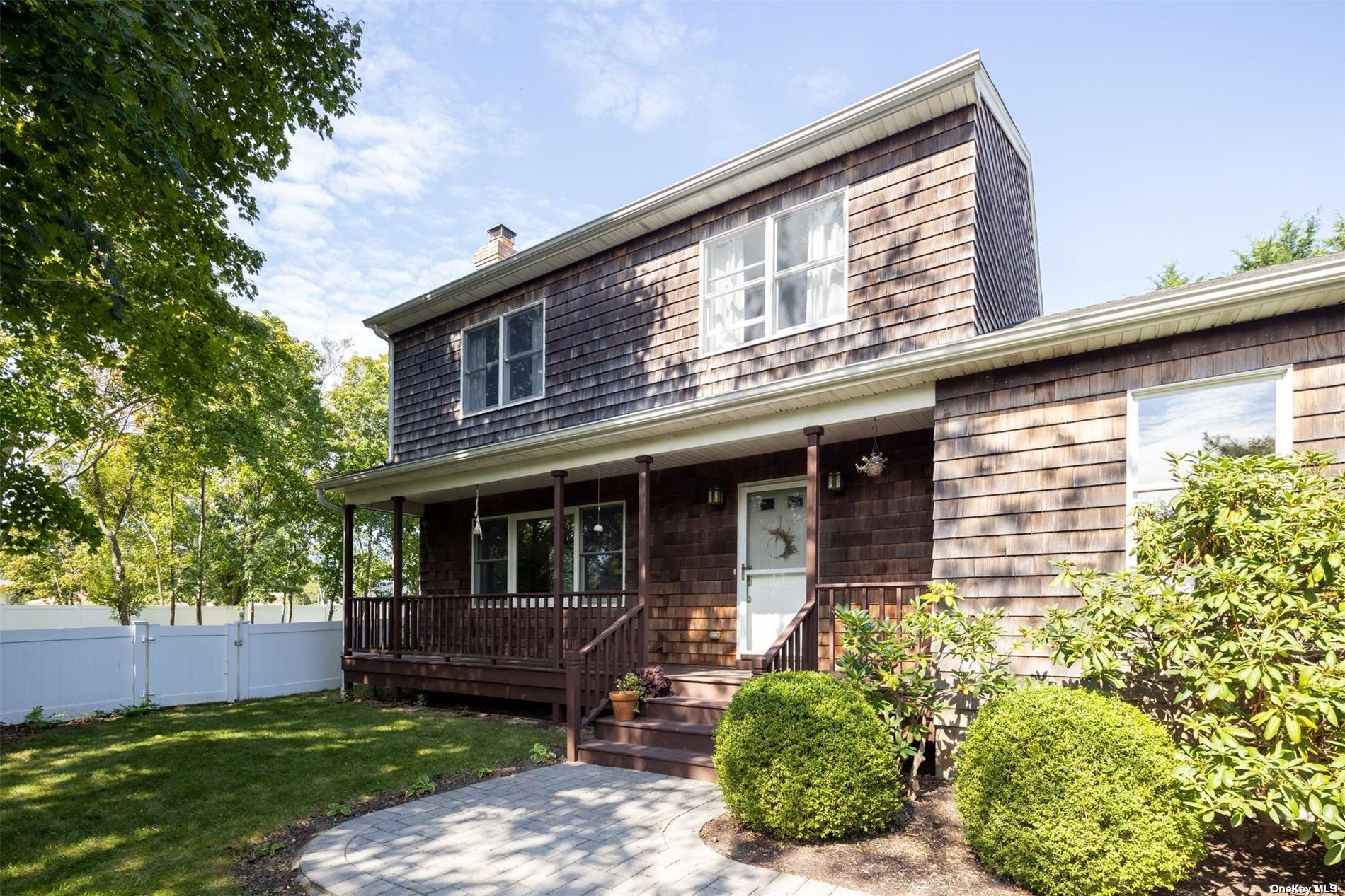 front view of house with a yard