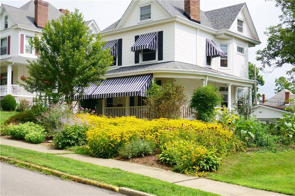 124 5th Street McDonald, PA 15057 - Photo 1 of 24 front view of a house with a yard