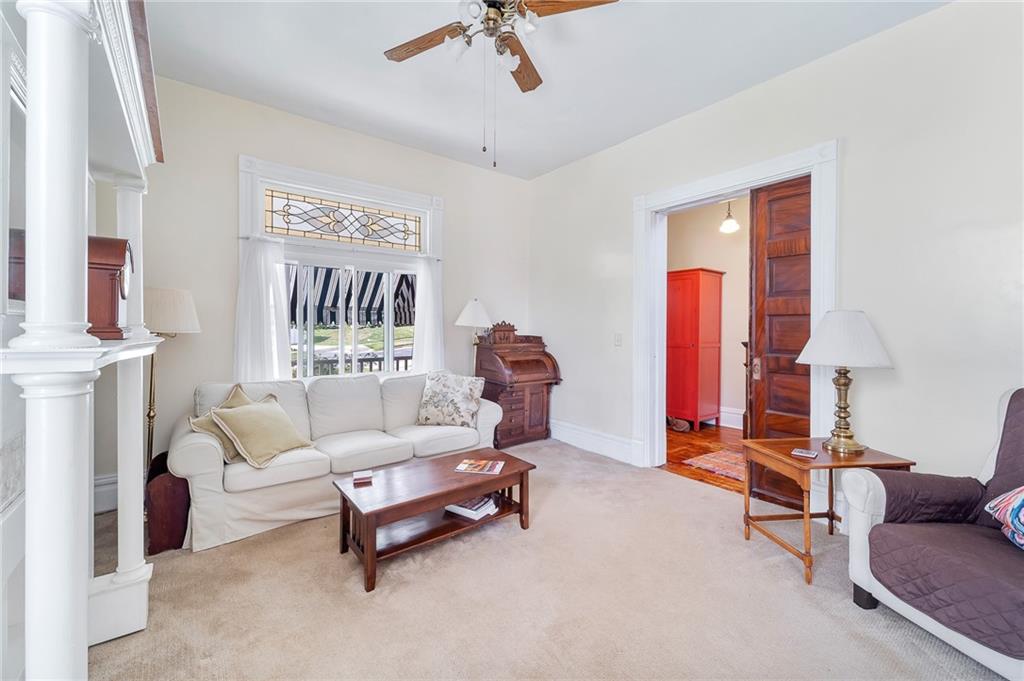 124 5th Street McDonald, PA 15057 - Photo 7 of 24 a living room with furniture and a chandelier