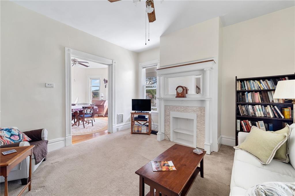 124 5th Street McDonald, PA 15057 - Photo 10 of 24 a living room with furniture and a flat screen tv