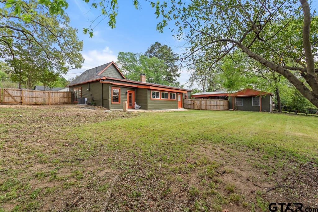2819 New Copeland Road Tyler, TX 75701 - Photo 31 of 39 a view of a house with a yard