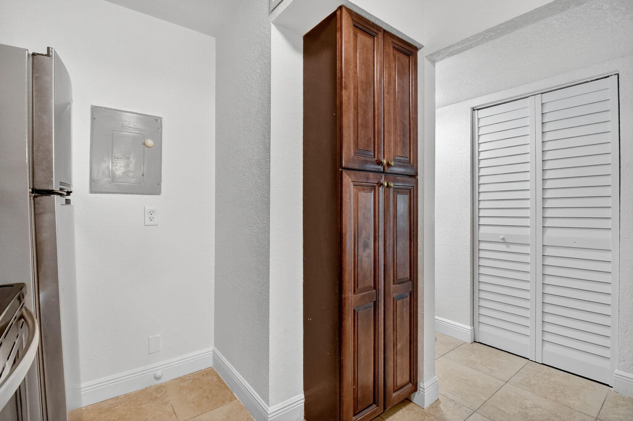 208 Foxtail Drive, Unit B2 Greenacres, FL 33415 - Photo 14 of 33 a view of a hallway with closet and door