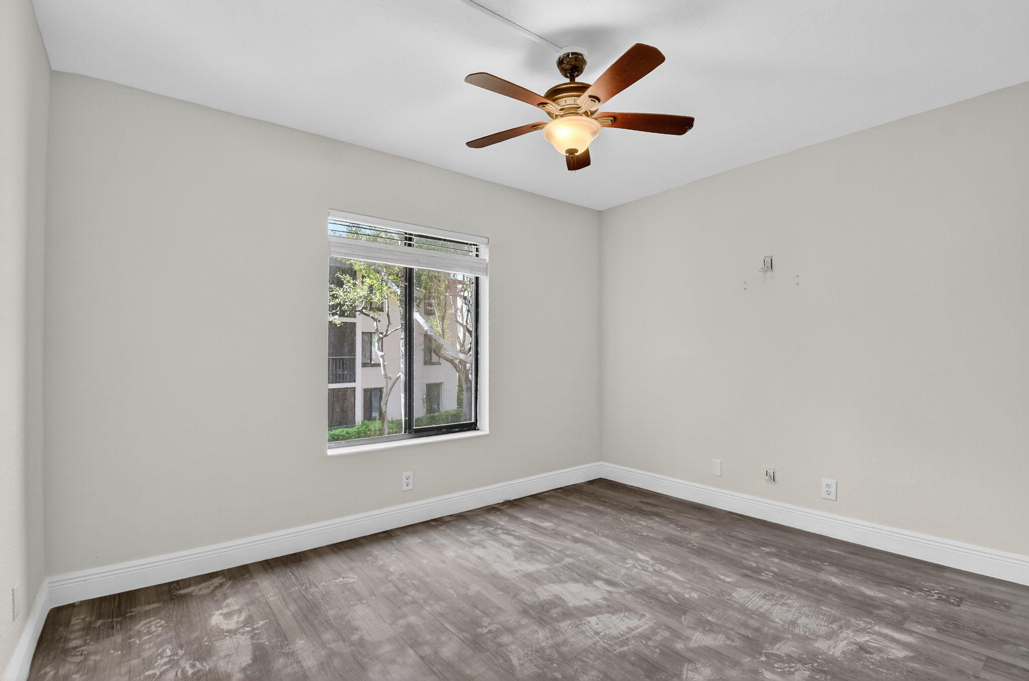 208 Foxtail Drive, Unit B2 Greenacres, FL 33415 - Photo 18 of 33 an empty room with a window