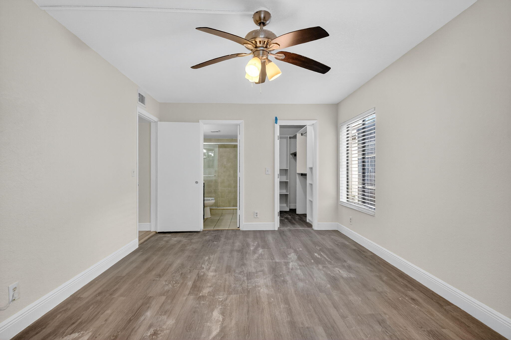 208 Foxtail Drive, Unit B2 Greenacres, FL 33415 - Photo 23 of 33 a view of an empty room with a window