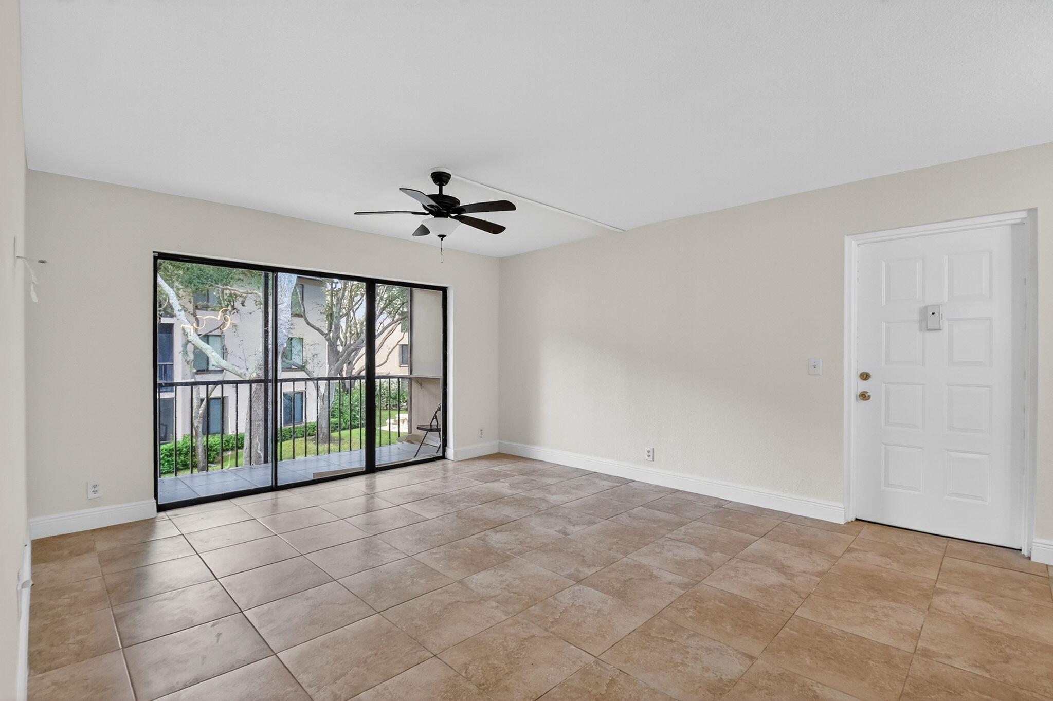 208 Foxtail Drive, Unit B2 Greenacres, FL 33415 - Photo 5 of 33 a view of an empty room with a window