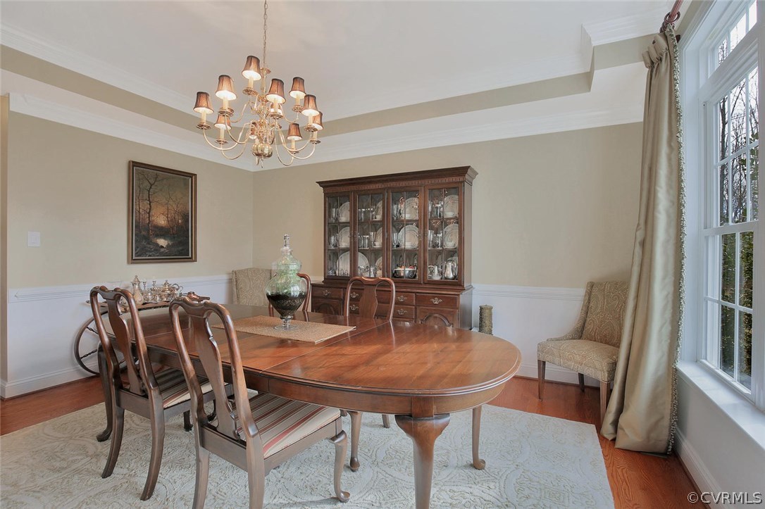 1780 Hawk Town Road Maidens, VA 23102 - Photo 8 of 49 a view of a dining room with furniture and a chandelier
