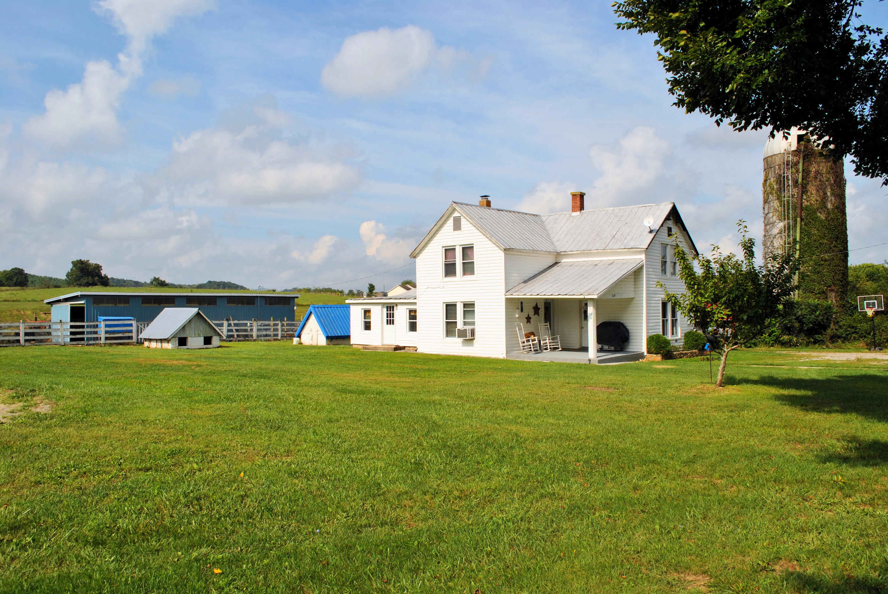 679 Union Valley Road Riner, VA 24149 - Photo 2 of 69 a front view of a house with garden