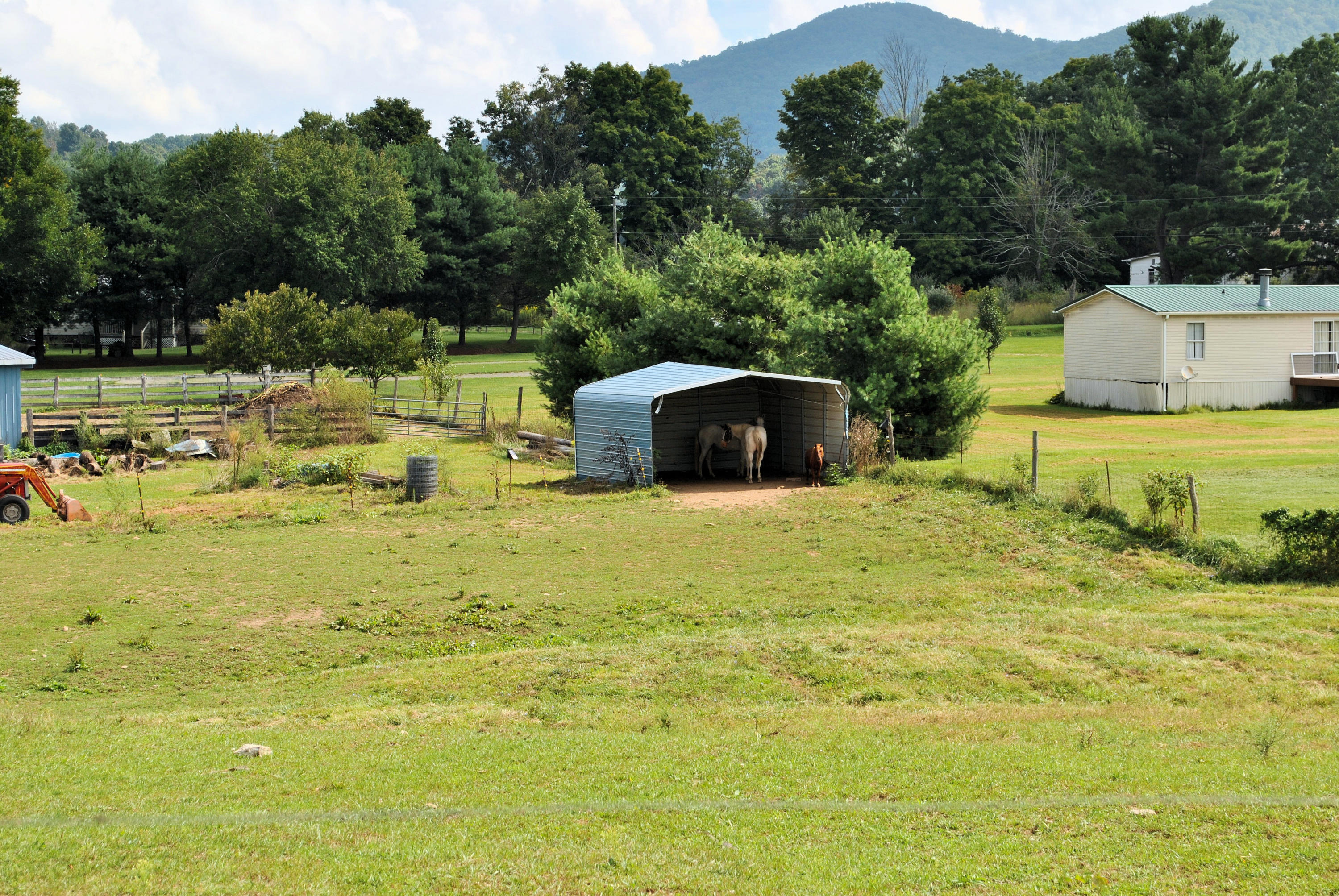 679 Union Valley Road Riner, VA 24149 - Photo 60 of 69 a swimming pool with outdoor seating and yard