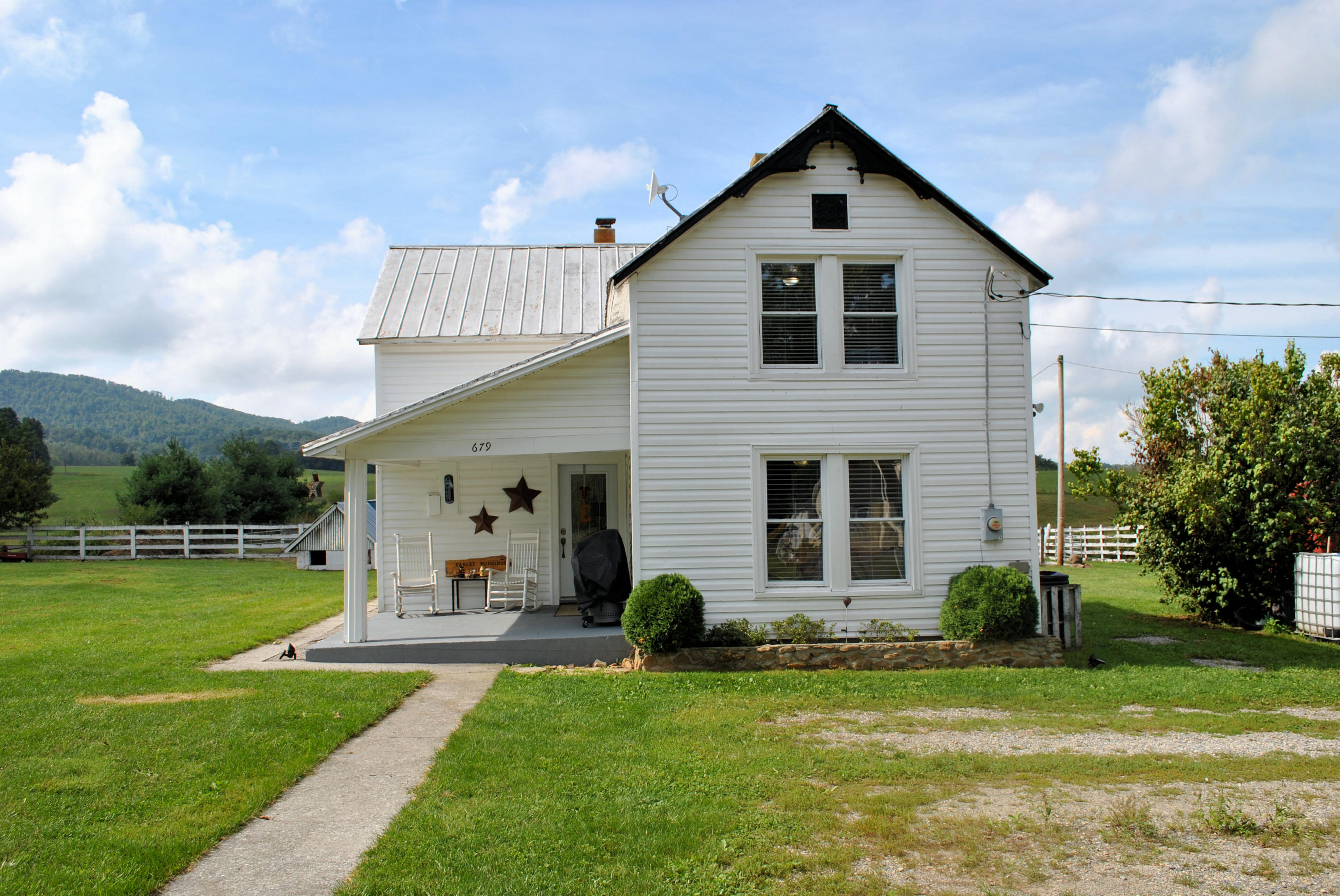 679 Union Valley Road Riner, VA 24149 - Photo 7 of 69 a front view of a house with garden