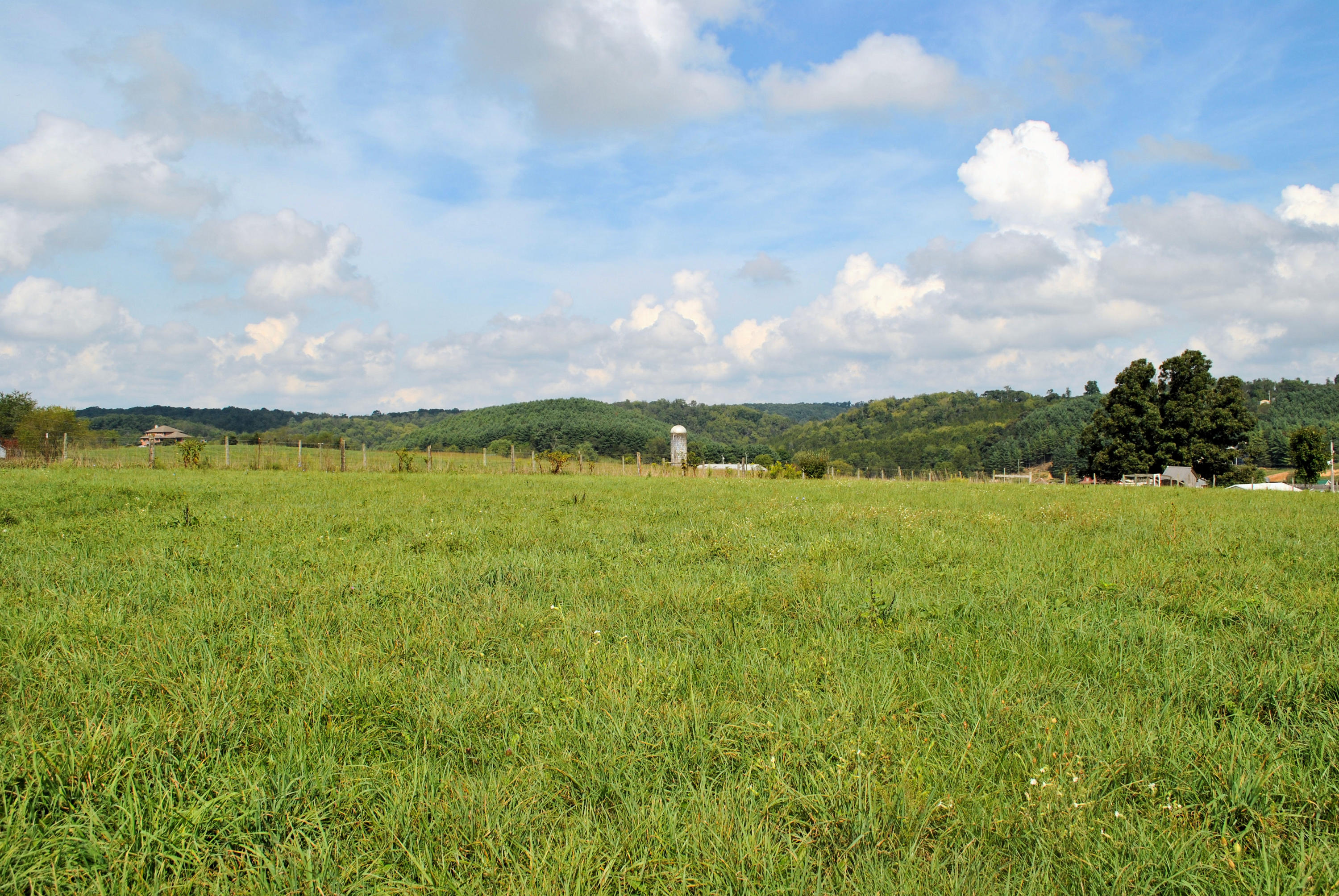 679 Union Valley Road Riner, VA 24149 - Photo 64 of 69 a view of a lake with houses in the back