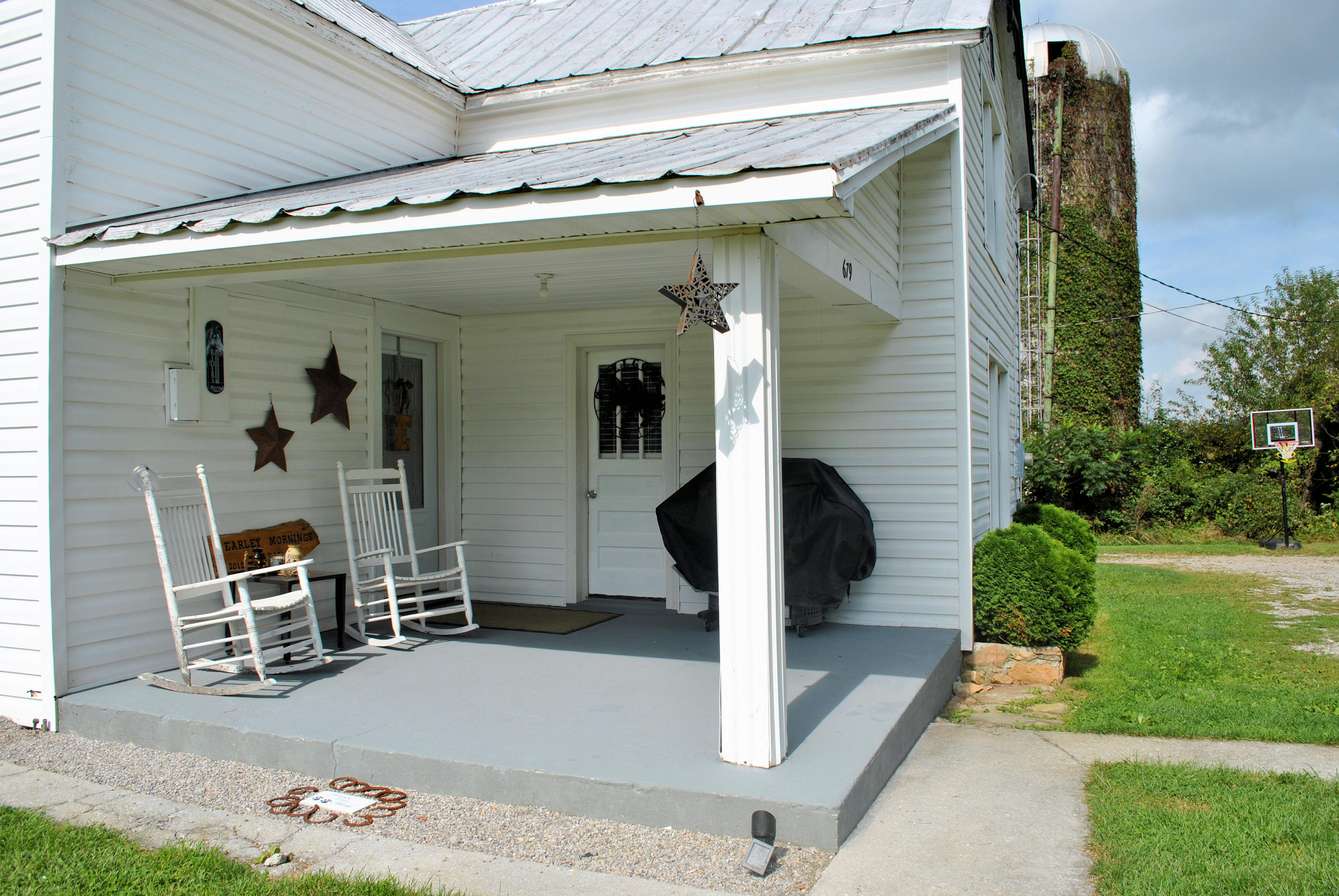679 Union Valley Road Riner, VA 24149 - Photo 8 of 69 a front view of a house with garden
