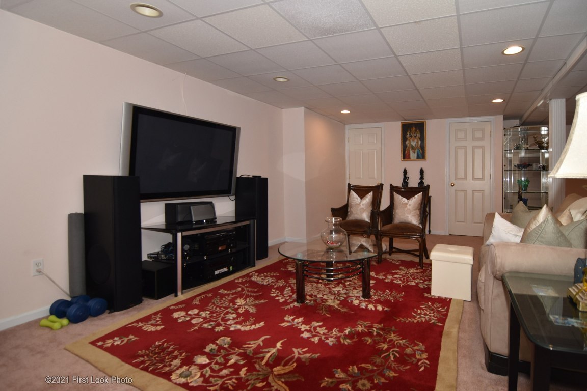 64 Red Hawk Drive Cranston, RI 02921 - Photo 38 of 49 RECREATION ROOM IN THE LOWER LEVEL