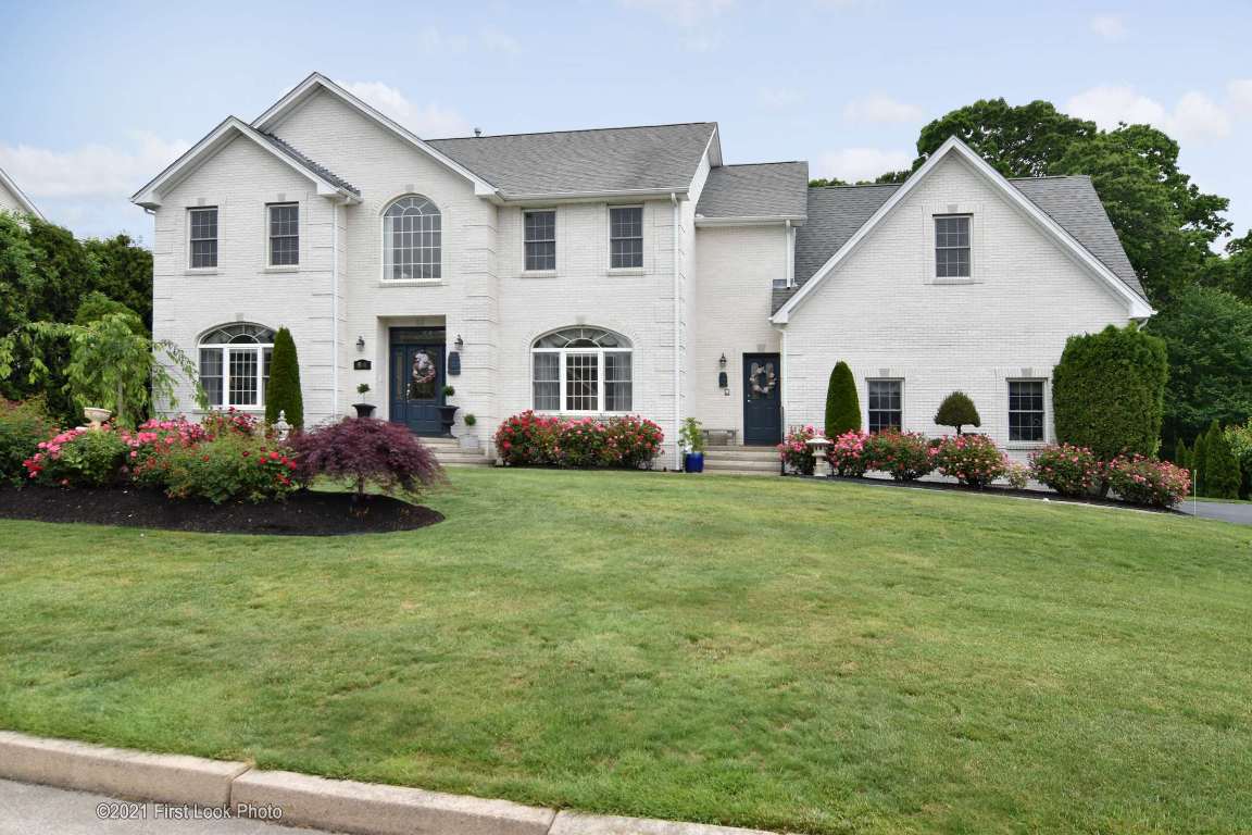 64 Red Hawk Drive Cranston, RI 02921 - Photo 46 of 49 FRONT OF THE HOME AND BEAUTIFUL LANDSCAPING