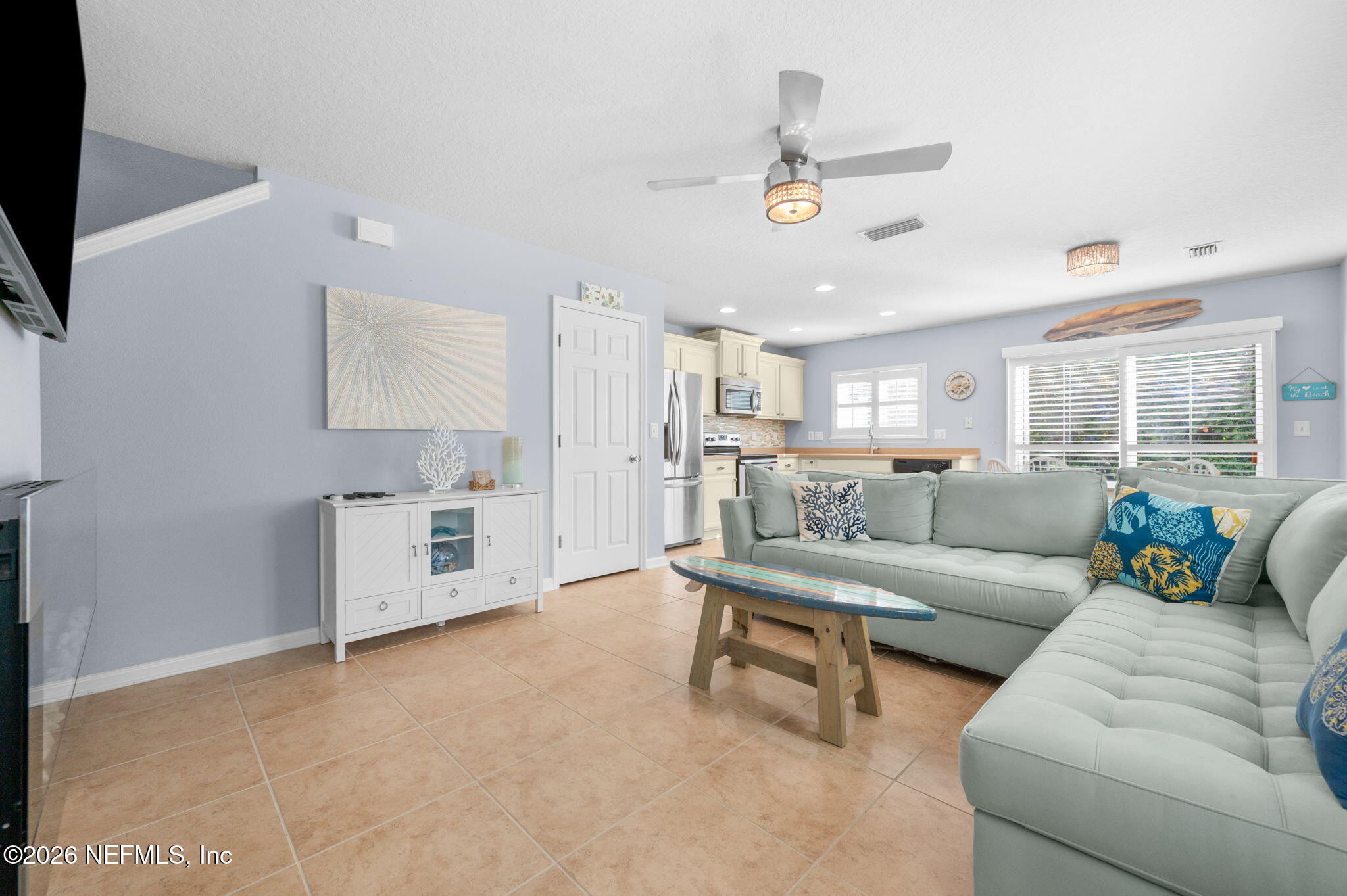 12 Islander Court St. Augustine, FL 32080 - Photo 14 of 53 a living room with furniture and a flat screen tv