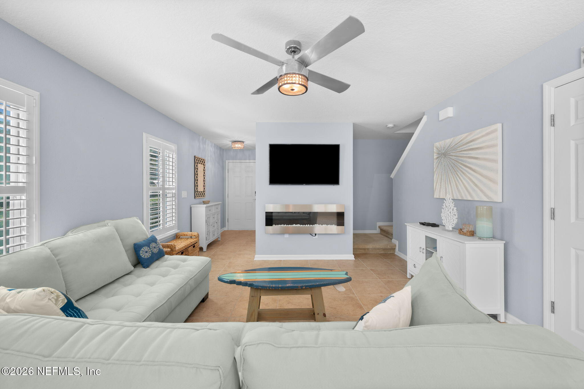 12 Islander Court St. Augustine, FL 32080 - Photo 15 of 53 a living room with furniture and a flat screen tv