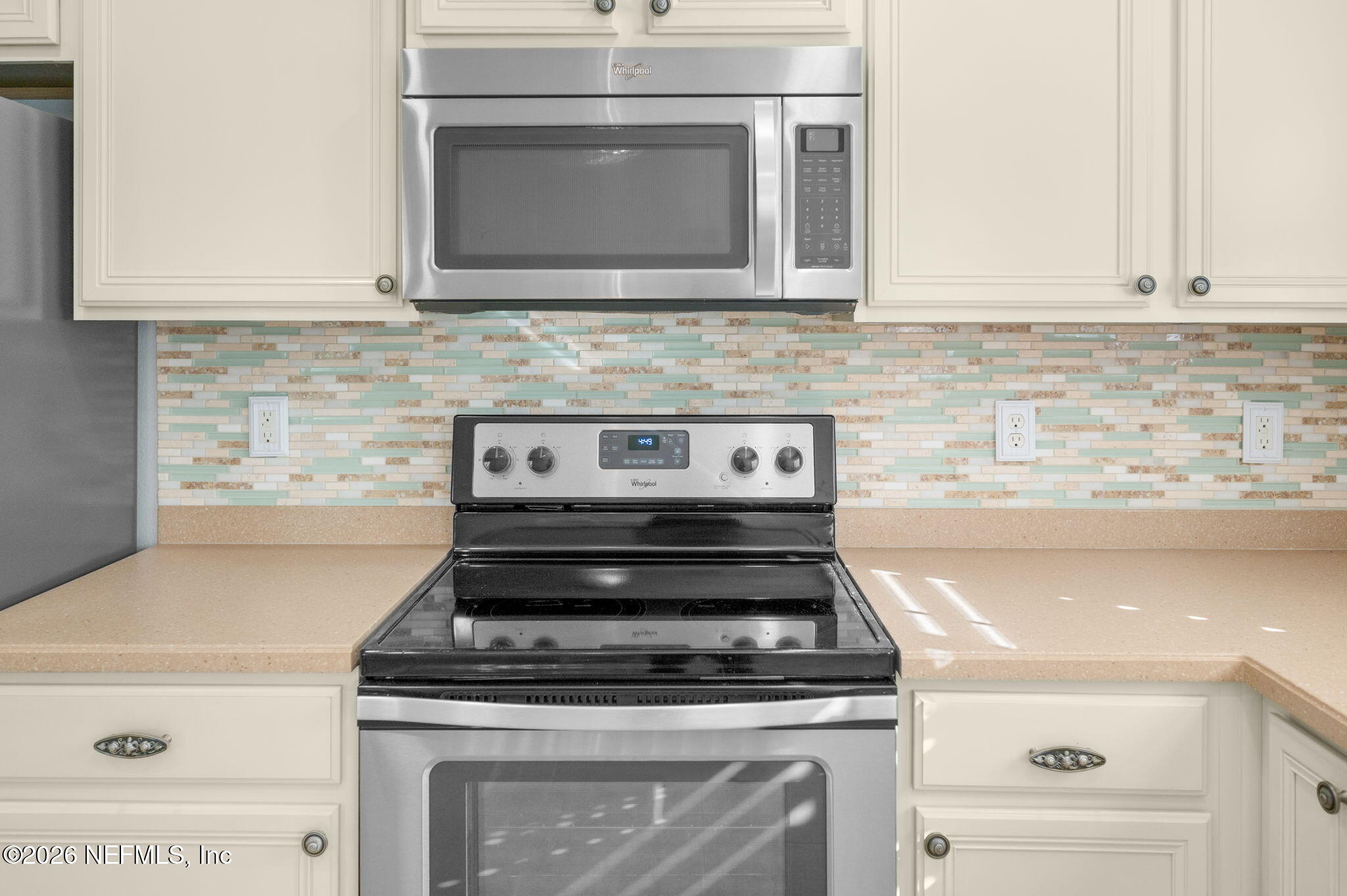 12 Islander Court St. Augustine, FL 32080 - Photo 20 of 53 a stove top oven sitting inside of a kitchen and granite counter tops