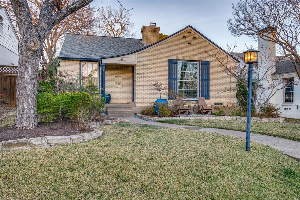 818 Valencia Street Dallas, TX 75223 - Photo 3 of 38 a front view of a house with garden