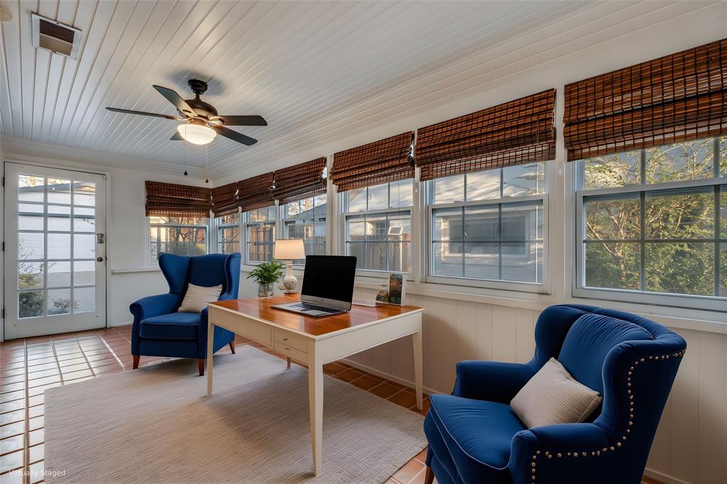 818 Valencia Street Dallas, TX 75223 - Photo 32 of 38 a work room with furniture and a window