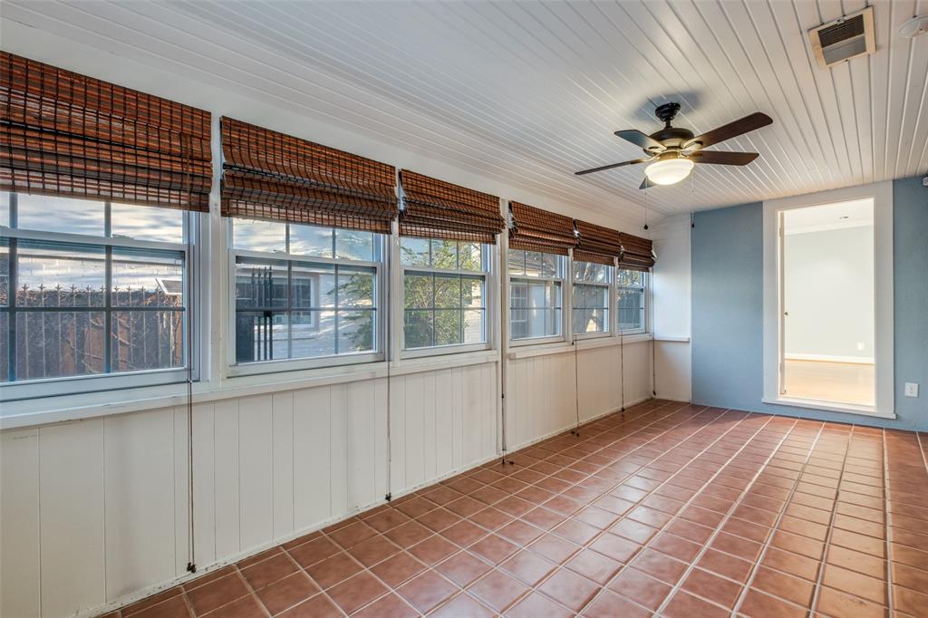 818 Valencia Street Dallas, TX 75223 - Photo 33 of 38 a view of empty room with wooden floor and fan