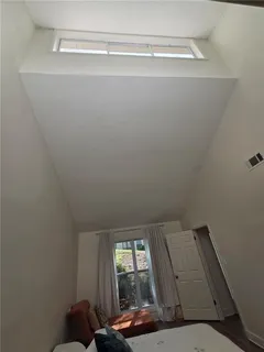a living room with furniture and window