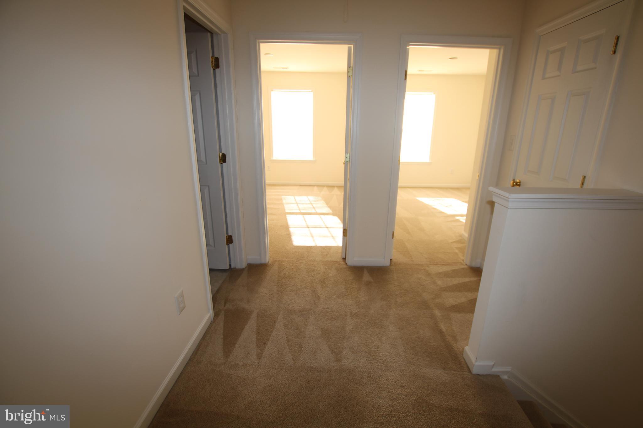 35385 Winthrop Court, Unit B162 Millsboro, DE 19966 - Photo 15 of 18 a view of an empty room and window