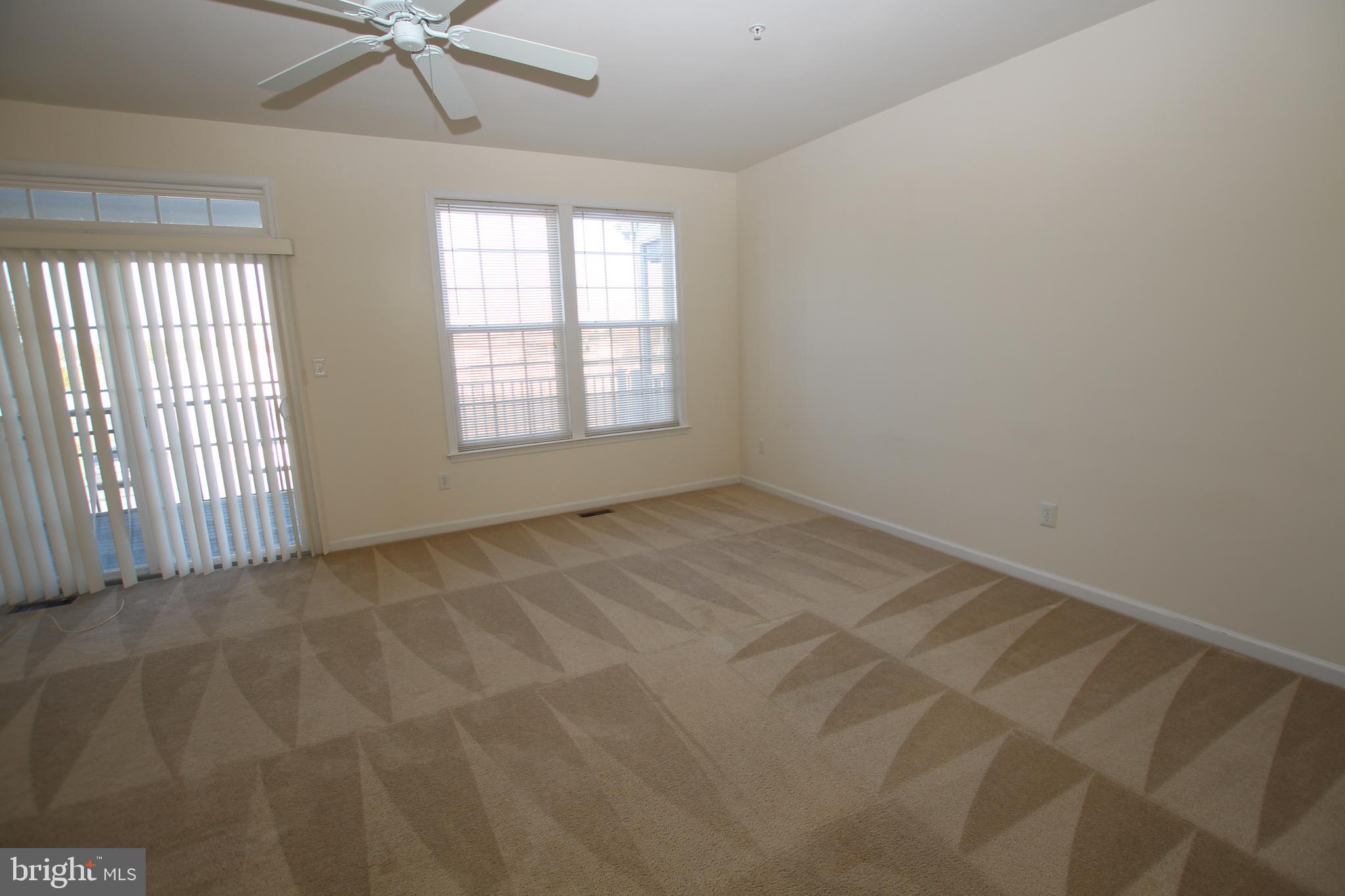35385 Winthrop Court, Unit B162 Millsboro, DE 19966 - Photo 5 of 18 an empty room with a window