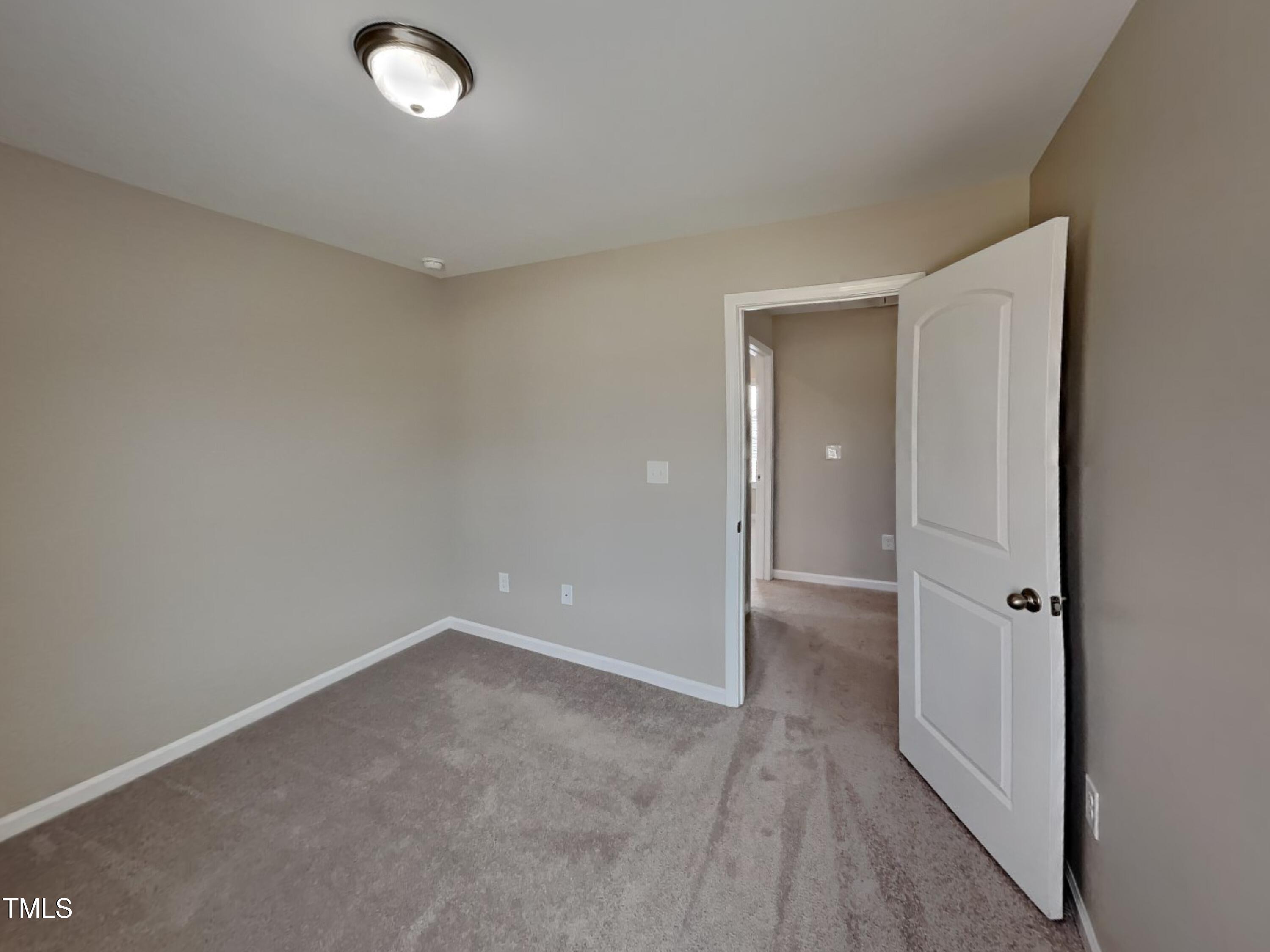 376 Olde Place Drive Zebulon, NC 27597 - Photo 11 of 16 a view of an empty room