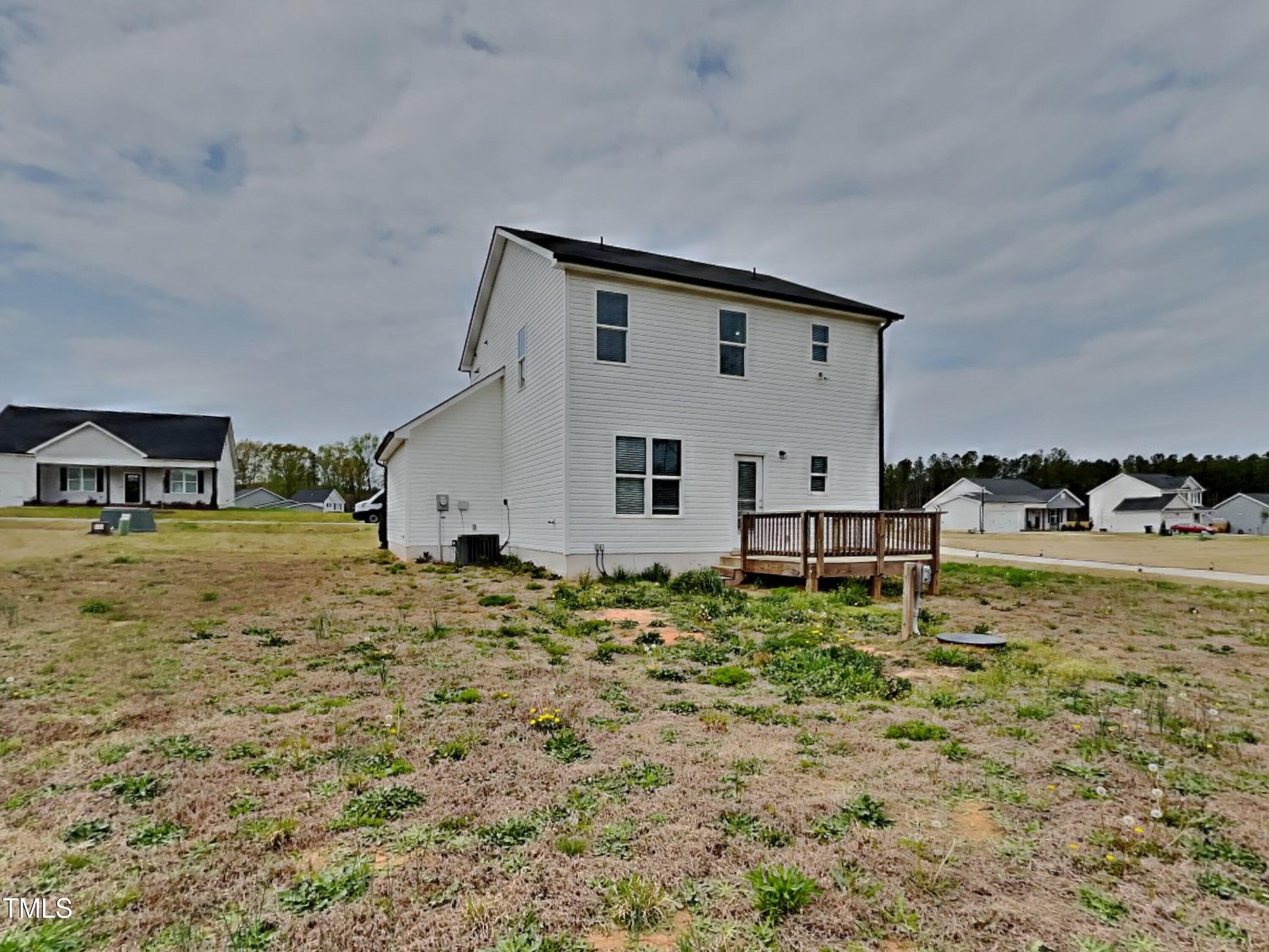 376 Olde Place Drive Zebulon, NC 27597 - Photo 16 of 16 a house view with a outdoor space