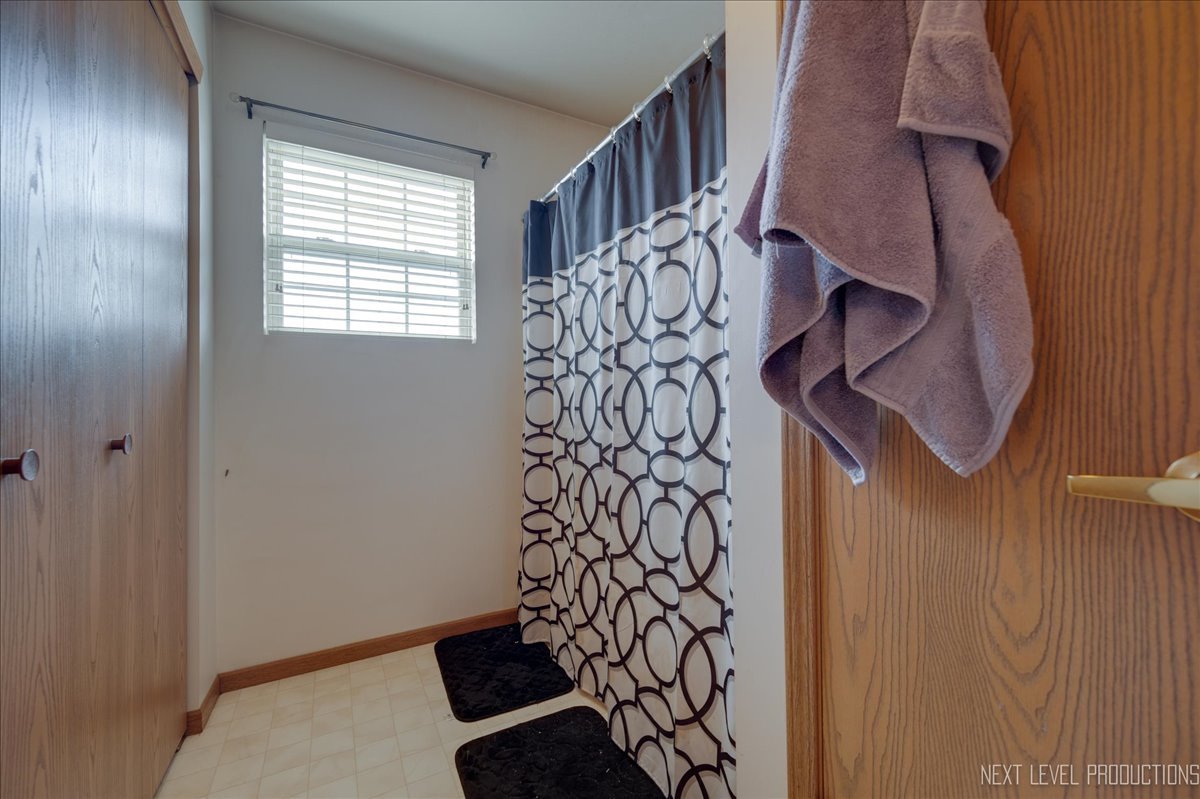 1506 Spring Brook Court, Unit 2A Round Lake Beach, IL 60073 - Photo 7 of 13 a view of entryway