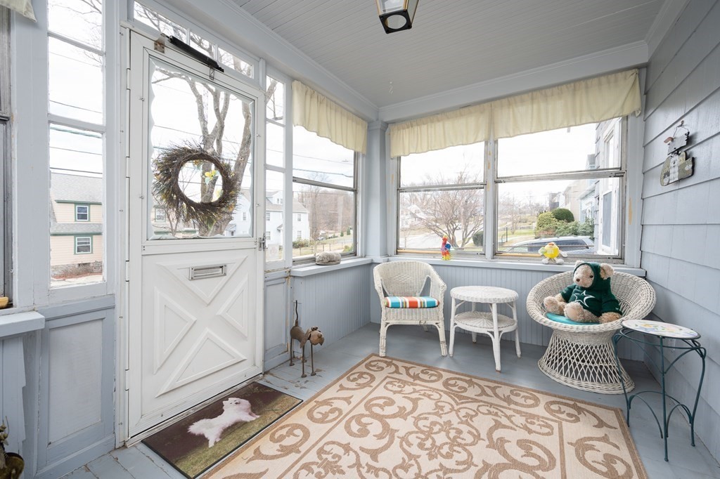 271 Beverly Road Worcester, MA 01605 - Photo 4 of 22 a living room with furniture and a large window