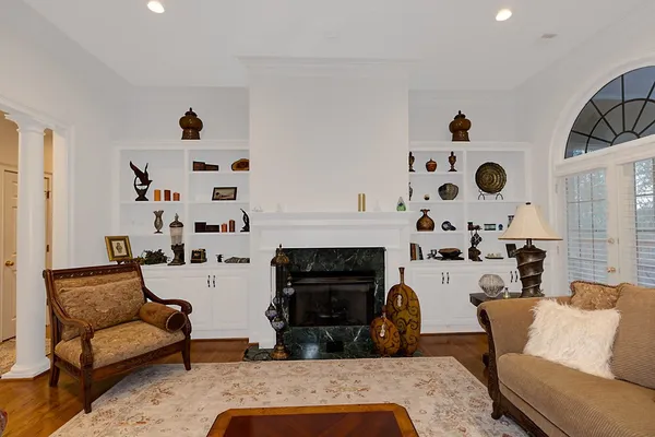 a kitchen with stainless steel appliances granite countertop a stove and cabinets