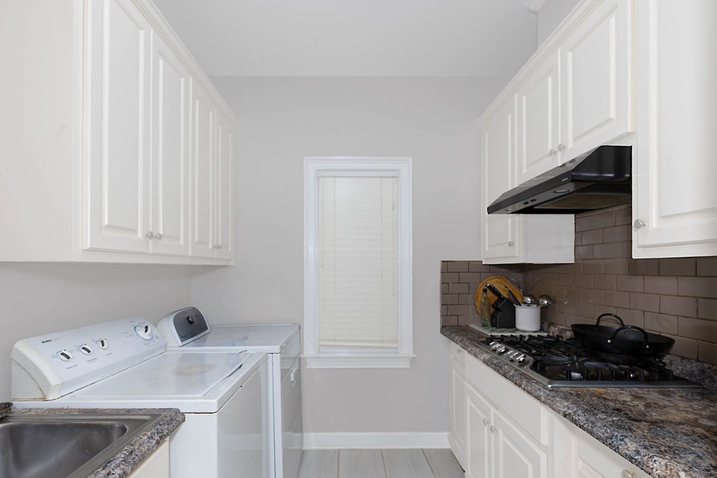 7633 Grand Ridge Road Columbus, GA 31904 - Photo 40 of 61 a kitchen with a sink and cabinets