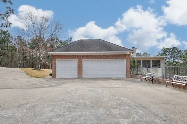 a view of a house with a sink and yard
