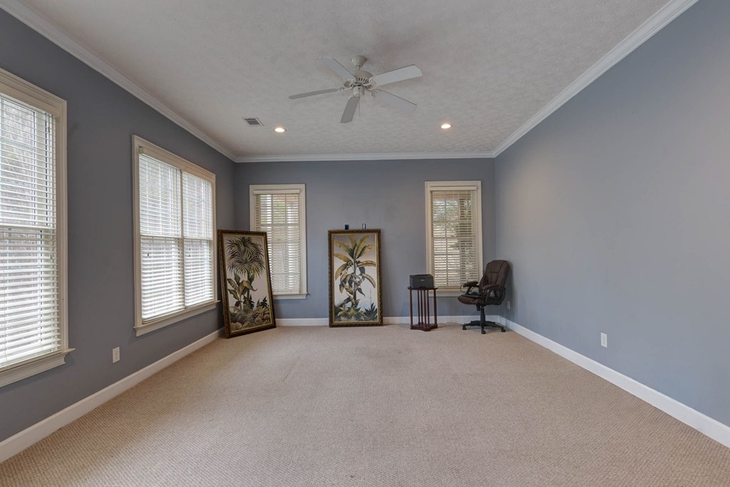 7633 Grand Ridge Road Columbus, GA 31904 - Photo 42 of 61 a view of a livingroom with furniture and a window
