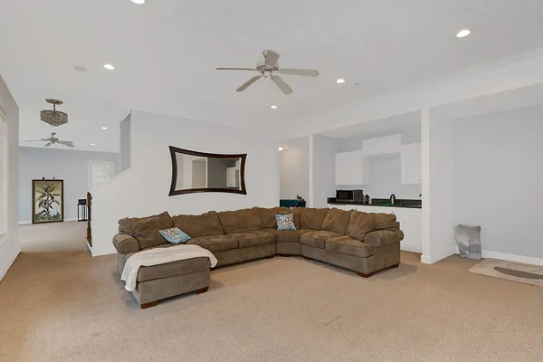 a bedroom with bed and window