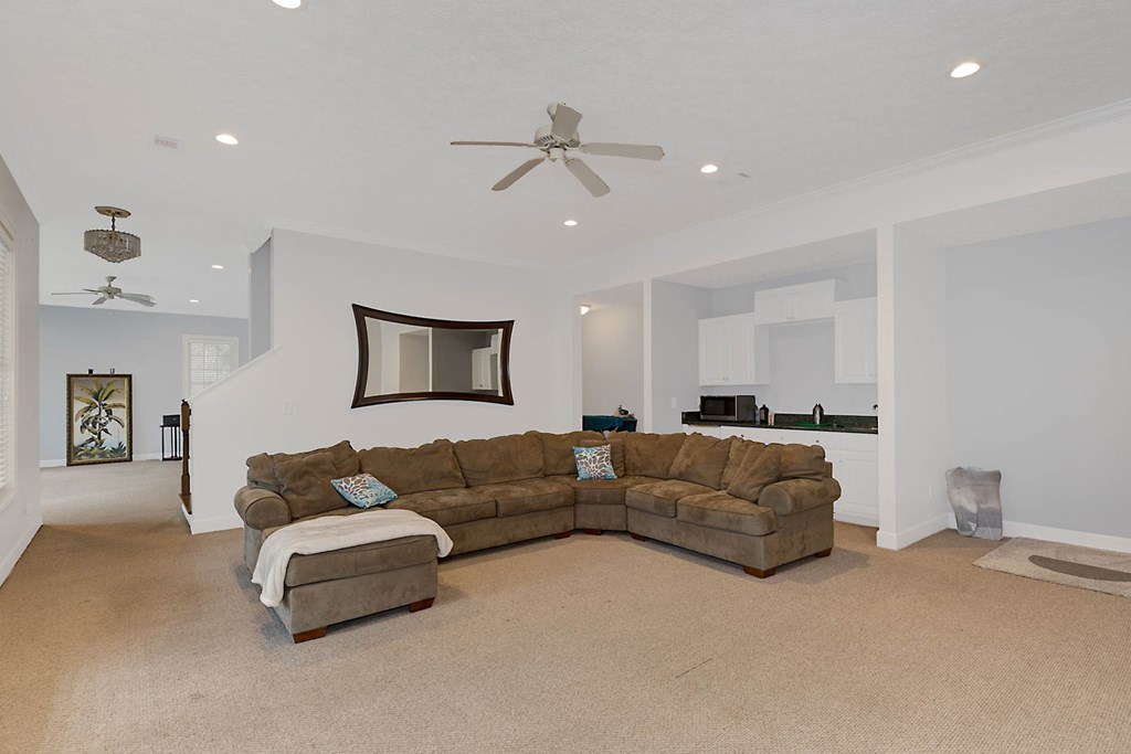 7633 Grand Ridge Road Columbus, GA 31904 - Photo 43 of 61 a living room with furniture and a couch