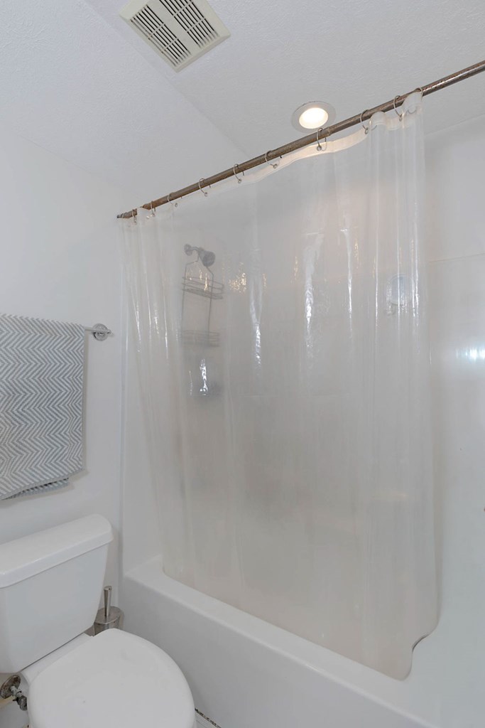 7633 Grand Ridge Road Columbus, GA 31904 - Photo 52 of 61 a bathroom with a shower and a toilet