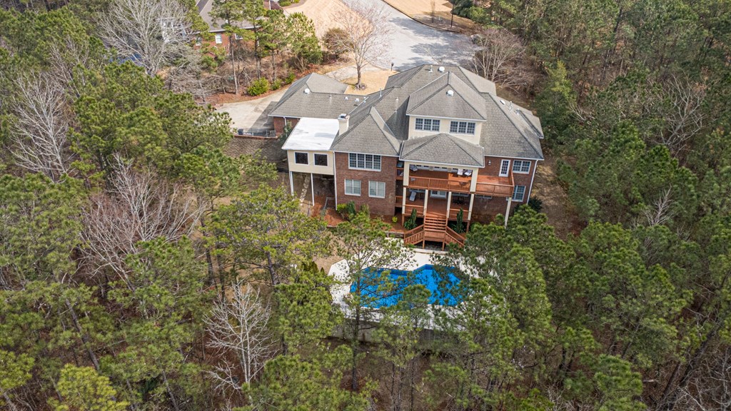 7633 Grand Ridge Road Columbus, GA 31904 - Photo 7 of 61 an aerial view of a house with a yard and potted plants