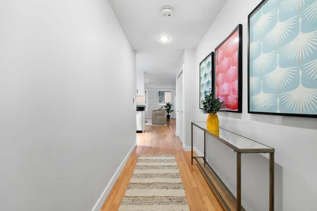 a view of a hallway with a couch