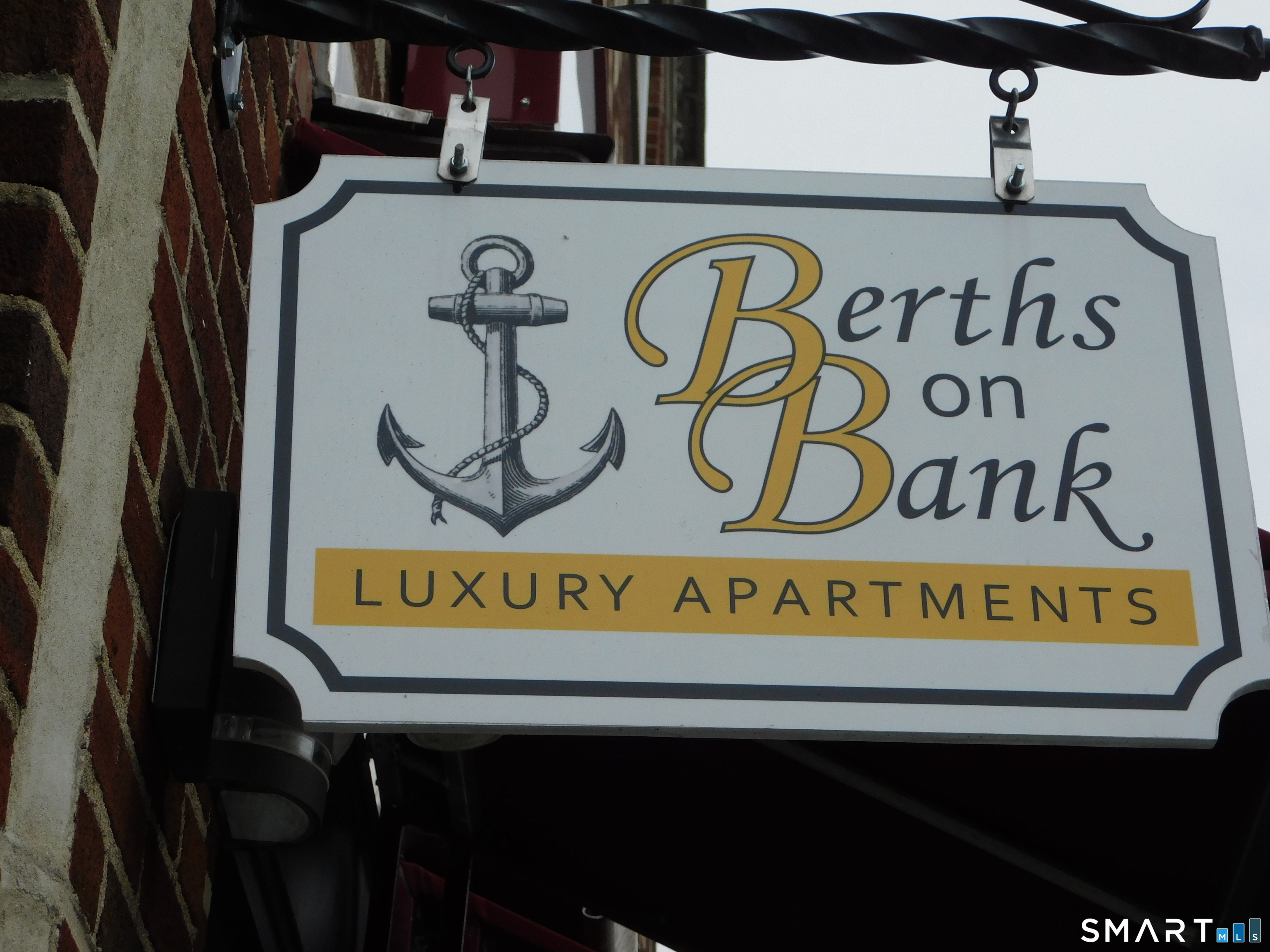 153 Bank Street, Unit 203 New London, CT 06320 - Photo 1 of 10 a close up of a street sign