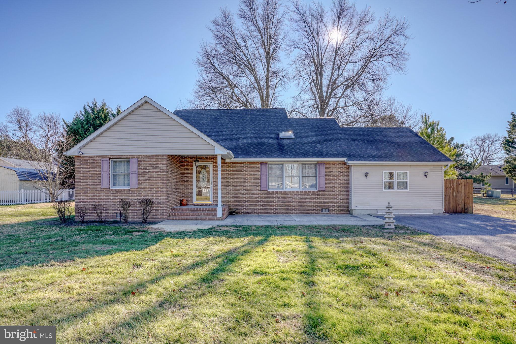 a house view with a garden space