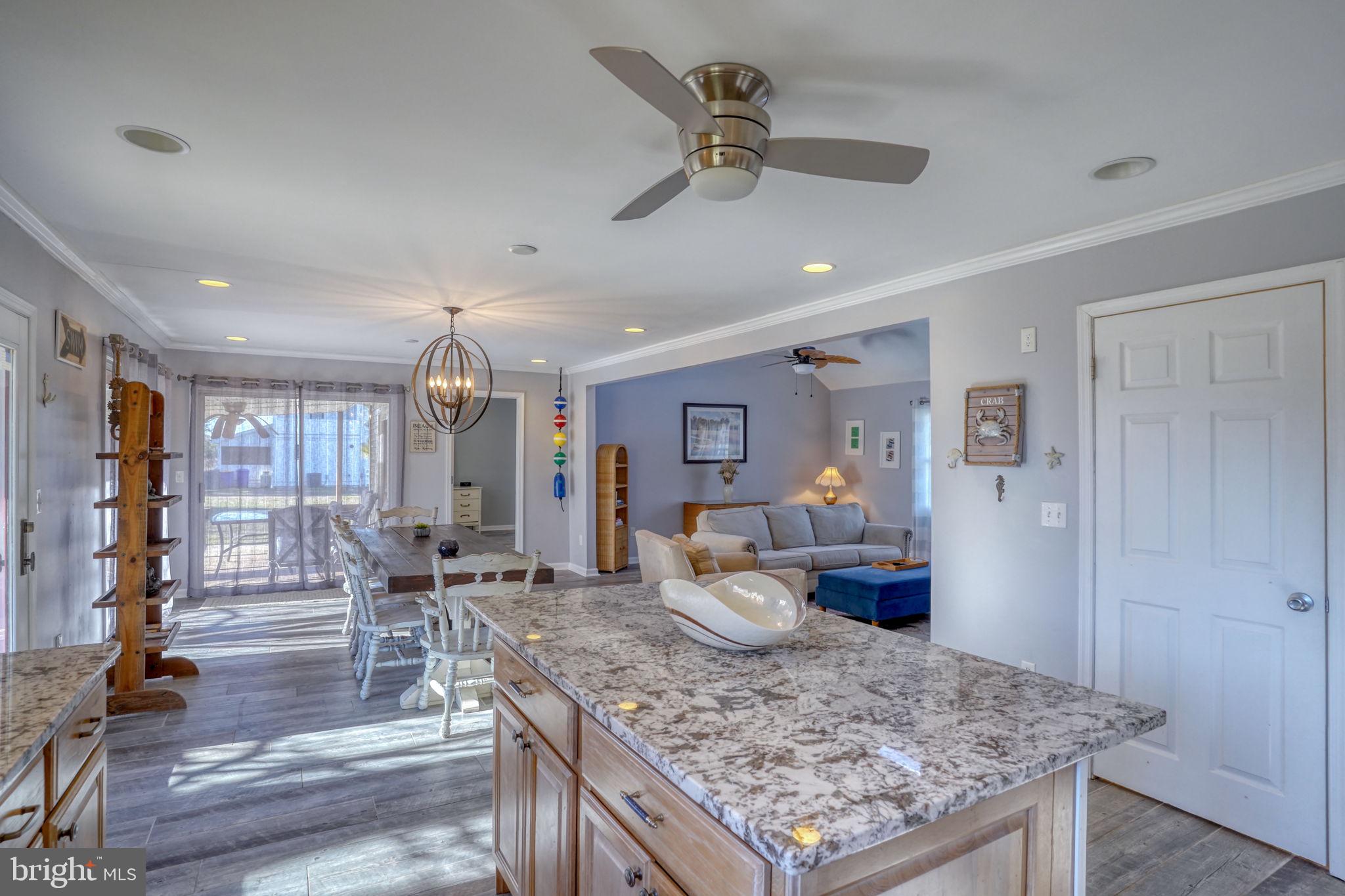 34772 Frontier Road Lewes, DE 19958 - Photo 18 of 66 a very nice looking living room with wooden floor and furniture