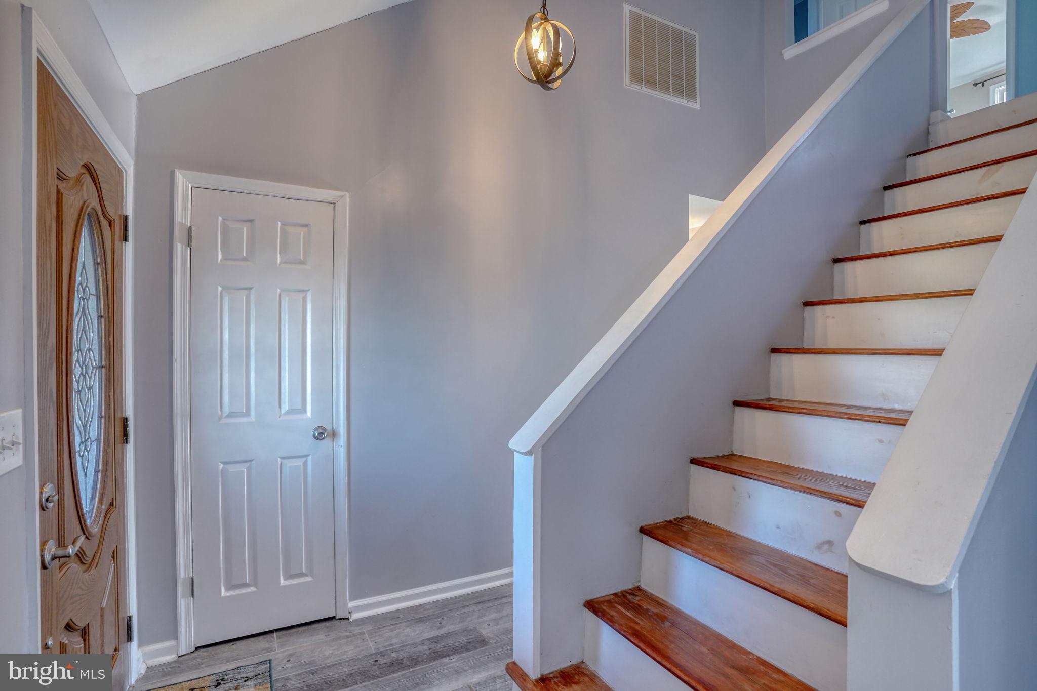 34772 Frontier Road Lewes, DE 19958 - Photo 29 of 66 a view of entryway with wooden floor