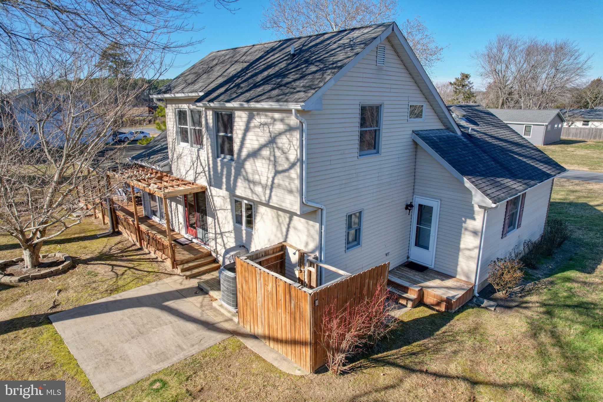 34772 Frontier Road Lewes, DE 19958 - Photo 37 of 66 a view of a house with wooden fence